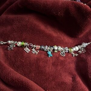 Pandora bracelet with Disney themed charms